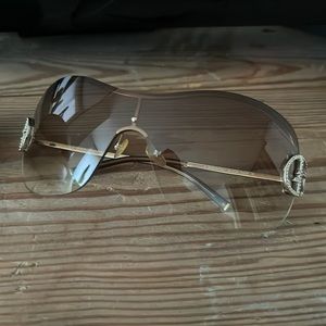 Armani sunglasses with rhinestone emblem